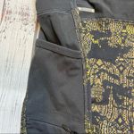 Lole  Burst Black and Gold Print Ankle Leggings. Size Small. EUC Photo 4