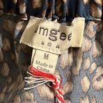 Umgee  medium leopard print skirt pockets front not lined elastic waistband NWT Photo 4