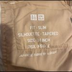 Uniqlo  slim tapered white waist 24 jeans. Photo 2