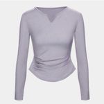 Halara Notched Ruched Thumb Hole Curved Hem Yoga Sports Top Photo 1