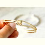 Boutique Women's 18k Gold Plated Knot Bling Simulated Diamond Cuff Bracelet, ‎ Adjustable Photo 6