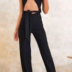 Pretty Little Thing black BLACK TEXTURED CROSS HALTER TIE WIDE LEG JUMPSUIT Size 0 Photo 1