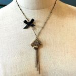 Gold tone love letters bow necklace Photo 0