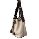 Dooney & Bourke DOONEY BOURKE Vintage Cream and Brown Leather Trim Bucket Bag Photo 1