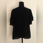 Ann Taylor - Black ruffled shoulders‎ short sleeve blouse 
Size M Photo 2