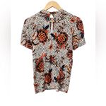Free People  Hear Me Roar Animal Print Floral Keyhole Short Sleeve Top Medium Photo 1