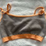Fabletics orange and grey sports bra. Size medium Photo 9