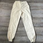 Dippin' Daisy's NWT Dippin’ Daisy’s Yellow Smile Sweatpants Size Small Photo 4