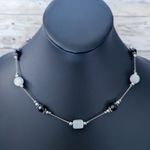 Silver Tone Necklaces with Black & White Photo 1