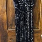 Altar'd State Altar’d State Chic Black and White Polka Dot Jumpsuit Photo 0