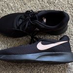 Nike  Women's Tanjun Sneakers size 12 Photo 0