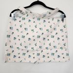 We Wore What Blue Floral Cut Out Denim Mini Skirt NWT Size Large Floral Jean Skirt Photo 2