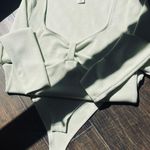 Divided Long Sleeve Powder Green Bodysuit Photo 4