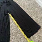 Becca  black strapless wide-leg jumpsuit size M Photo 6