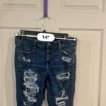 American Eagle  blue distressed skinny Photo 1