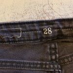 Levi's  Skinny Faded Black Painted Jean Photo 2