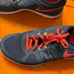 Nike  Black and Orange Athletic Shoes Photo 2