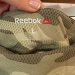 Reebok Lightly used  athletic leggings size large camo pattern Photo 2