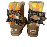 UGG  Bailey Bow Plaid Punk Chestnut Boots Women’s Size 7 Photo 1