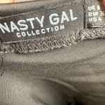 Nasty Gal black satin one shoulder jumpsuit size 4 Photo 4