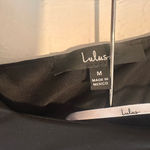 Lulus Night Out Attitude Black Ruched Tie-Back Long Sleeve Jumpsuit SzM Photo 6