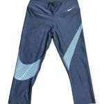 Nike  Women’s Athletic Mid-Rise Logo Front Capri Tights Photo 0