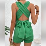 VCAY Solid Color Hollow‎ Out Cross Back Strap Romper Green Photo 2