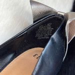Elle bow on back of the black faux leather platform heels Size 7 M stilettos. Photo 7