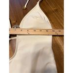 Plunge halter neck thong one piece swimsuit with metal shell medallion cream ivo Photo 4