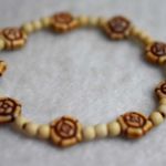 Source Unknown Vintage Terra Cotta Etched Flower Beaded Stretch Bracelet Photo 0