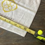 Kendra Scott Cream Dust Bag with Yellow Tassels Photo 4