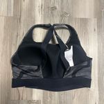 NWT size Large fits 38B/38C Supportive Padding, Grey and black sports bra Photo 1