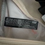 Free People  Bulls Eye Sling Bag. Color Mineral. MSRP $40  Photo 11