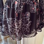 ASTR  Black and White Floral Romper with Bell Sleeves Photo 5