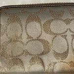 Coach  signature Charlie C zip around wallet gold with purple interior Photo 9