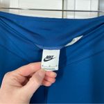 Nike ‎ Pants Blue Tight Fit Mid Rise Pull On Flare Slit Legging Size Medium Yoga Photo 3