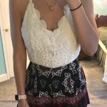 Charlotte Russe Patterned Lace Romper NWOT Photo 0