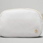 Lululemon Everywhere Belt Bag 1L Wordmark in Vapor/Gold/White, NWT Photo 5