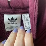 Adidas long sleeve cropped hoodie, maroon, women’s size small Photo 2