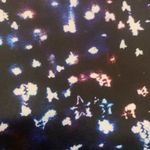 Spanx black galaxy star print crop leggings size M Photo 3