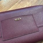Tumi saffiano travel wallet passport holder burgundy wristlet zip around Photo 1