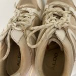 ALDO  Vany gold and white tennis shoes women’s size 7.5 in great shape Photo 8
