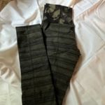 Lululemon  butterfly and striped Olive green and black leggings size 4 Photo 3
