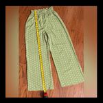 SheIn Olive Green high waste Polk dot wide leg pants - Size Small with Bag. Gently warn once and excellent condition. Measurements approximately 12” waste not fully stretched out from elastic waste band x 12” rise x 43” long. None smoking home. Priced to sell at as is condition. Don’t like my price, make reasonable offer. Photo 6