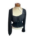 Nine Britton  sheer black long sleeve size small NWT - small snag in back see pic Photo 1