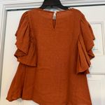 fab'rik Fab’rik orange flutter sleeve top Photo 1