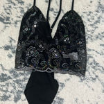 Lucy in the Sky  Glittery Black Top Photo 0