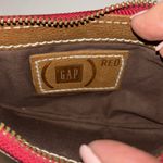 Gap RED AND TAN LEATHER FISH WRISTLET
SUPER CUTE PRELOVED Photo 5