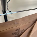 SKIMS ‎ SEAMLESS SCULPT MID THIGH SHORT NWOB size S between clay and mica Photo 4