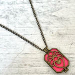 Pink heart box pendant on brass tone chain Photo 0